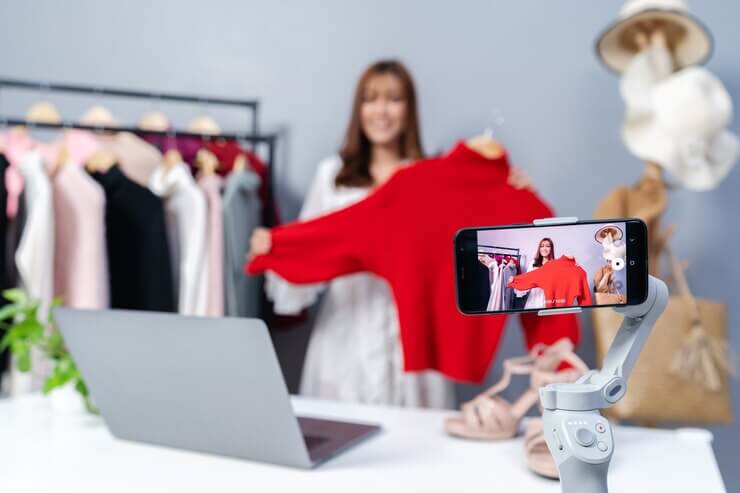 a woman using video marketing for her ecommerce website